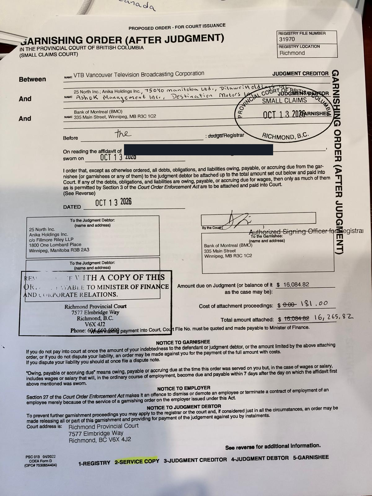 Supplied photograph of garnishing order with October 13, 2026 court stamp and signature, showing $16,265.82 total amount attached